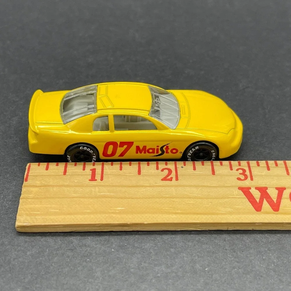 Maisto Chevrolet Chevy Monte Carlo Race Car #7 Yellow Diecast 1/64 Scale Loose